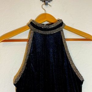Velvet black dress . Halter top with gunmetal beating
